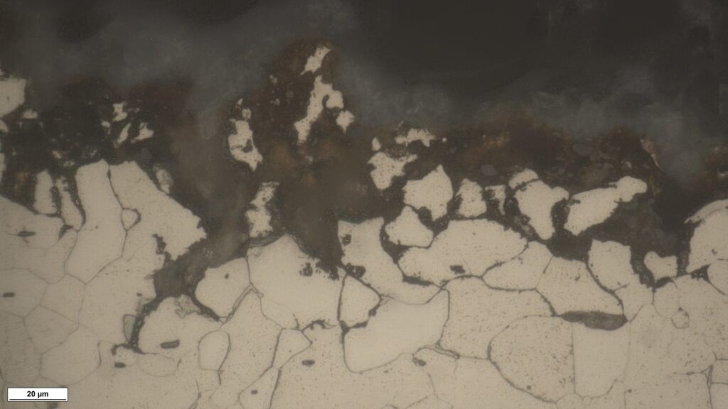 Edge rounding and relief in multi-phase alloy during metallographic sample preparation